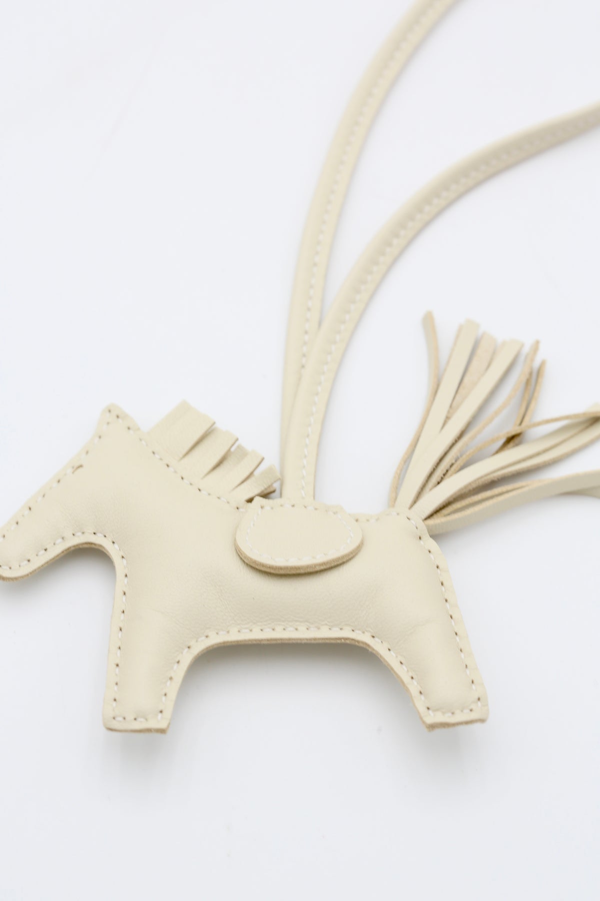 HERMÈS RODEO PM CHARM WHITE