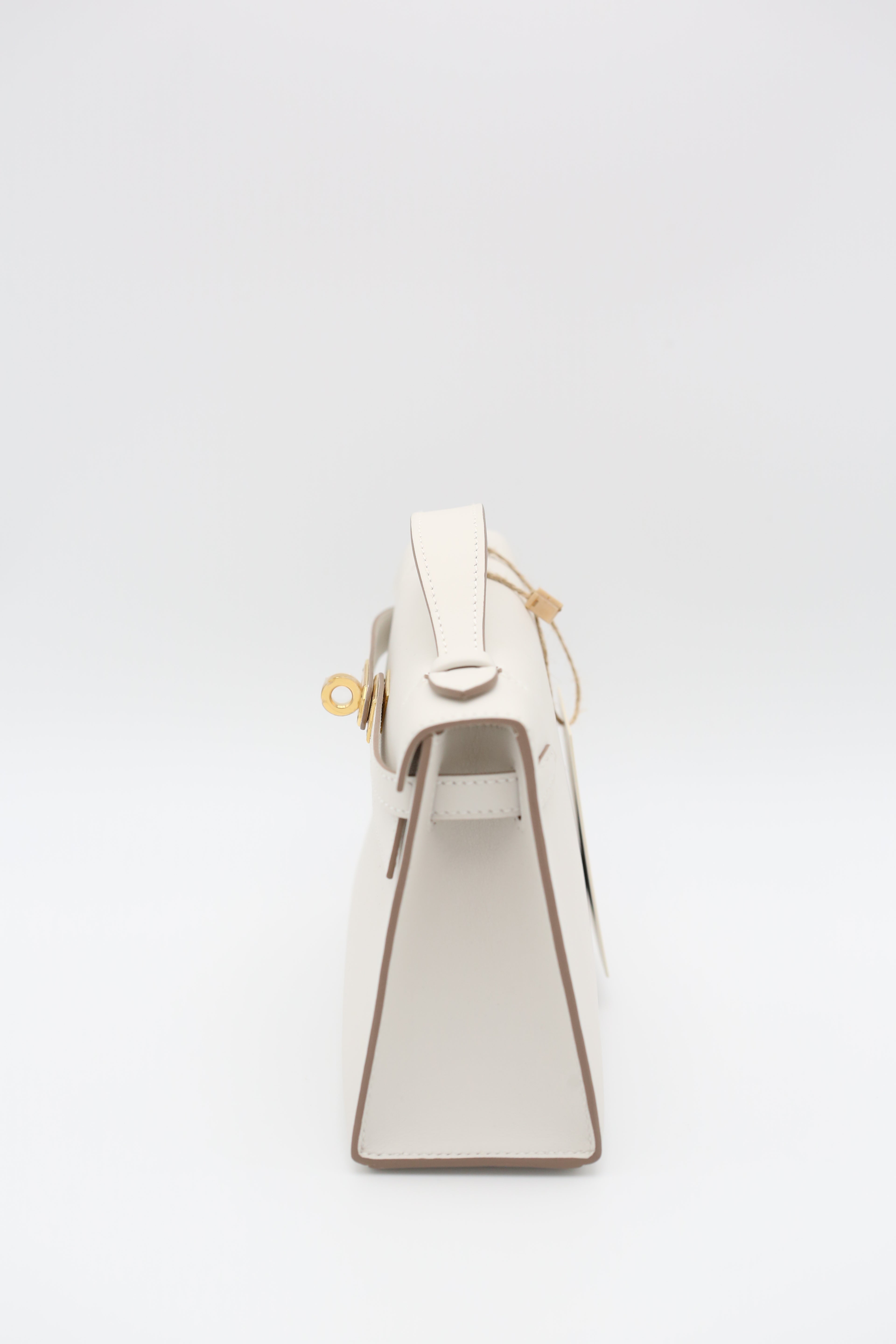 HERMÈS KELLY POCHETTE M4 GOLD