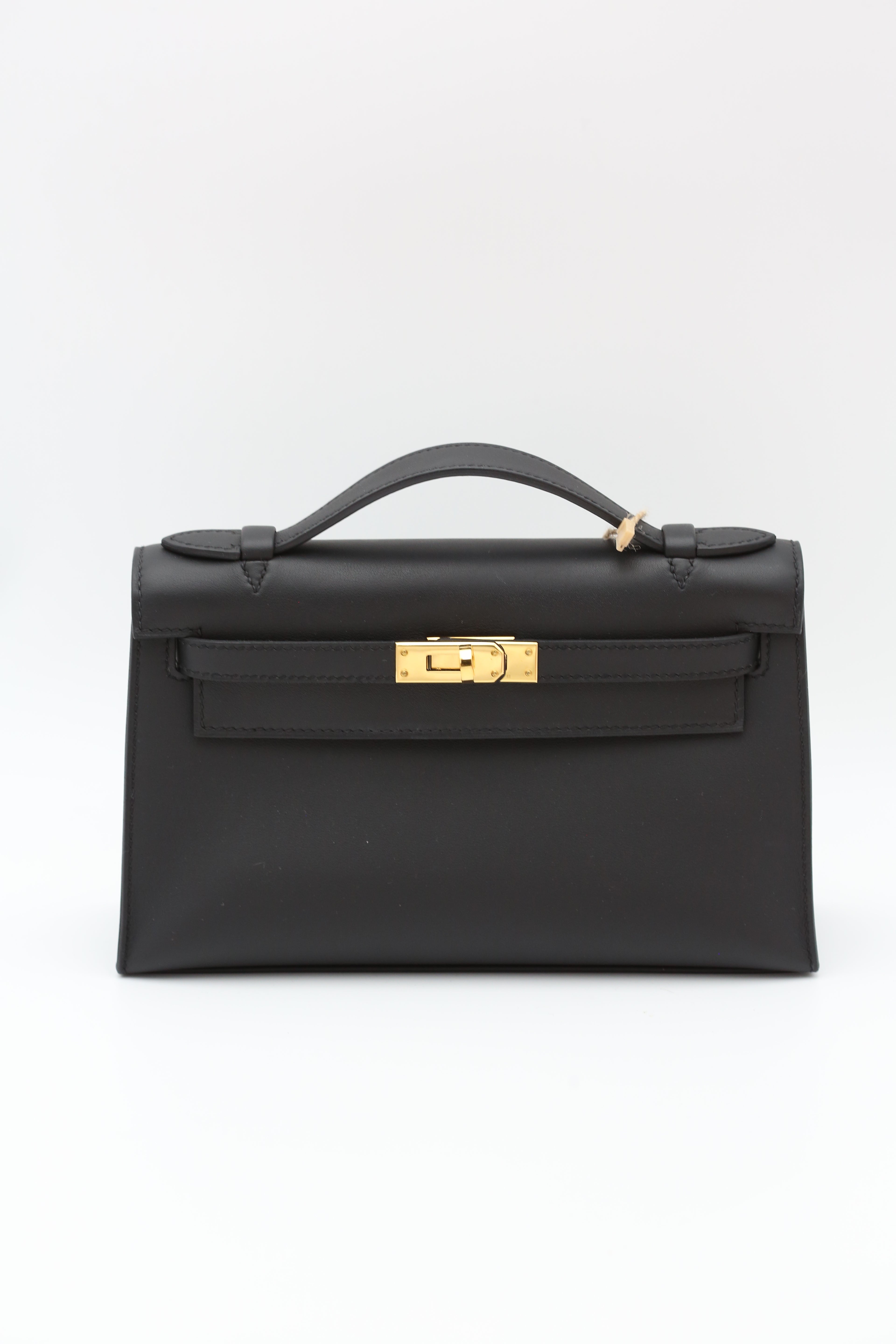HERMÈS KELLY POCHETTE NOIR SWIFT K STAMP