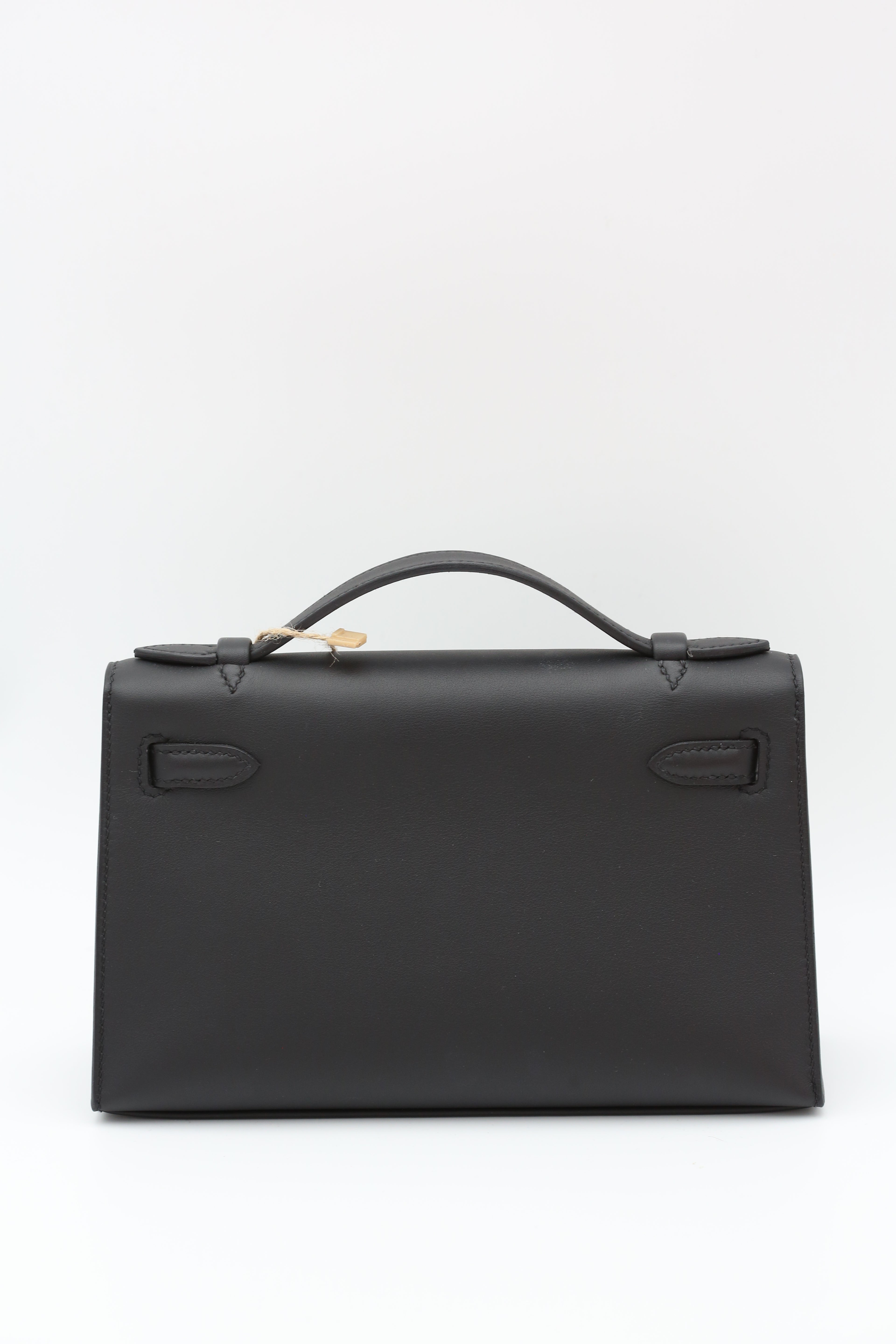 HERMÈS KELLY POCHETTE NOIR SWIFT K STAMP