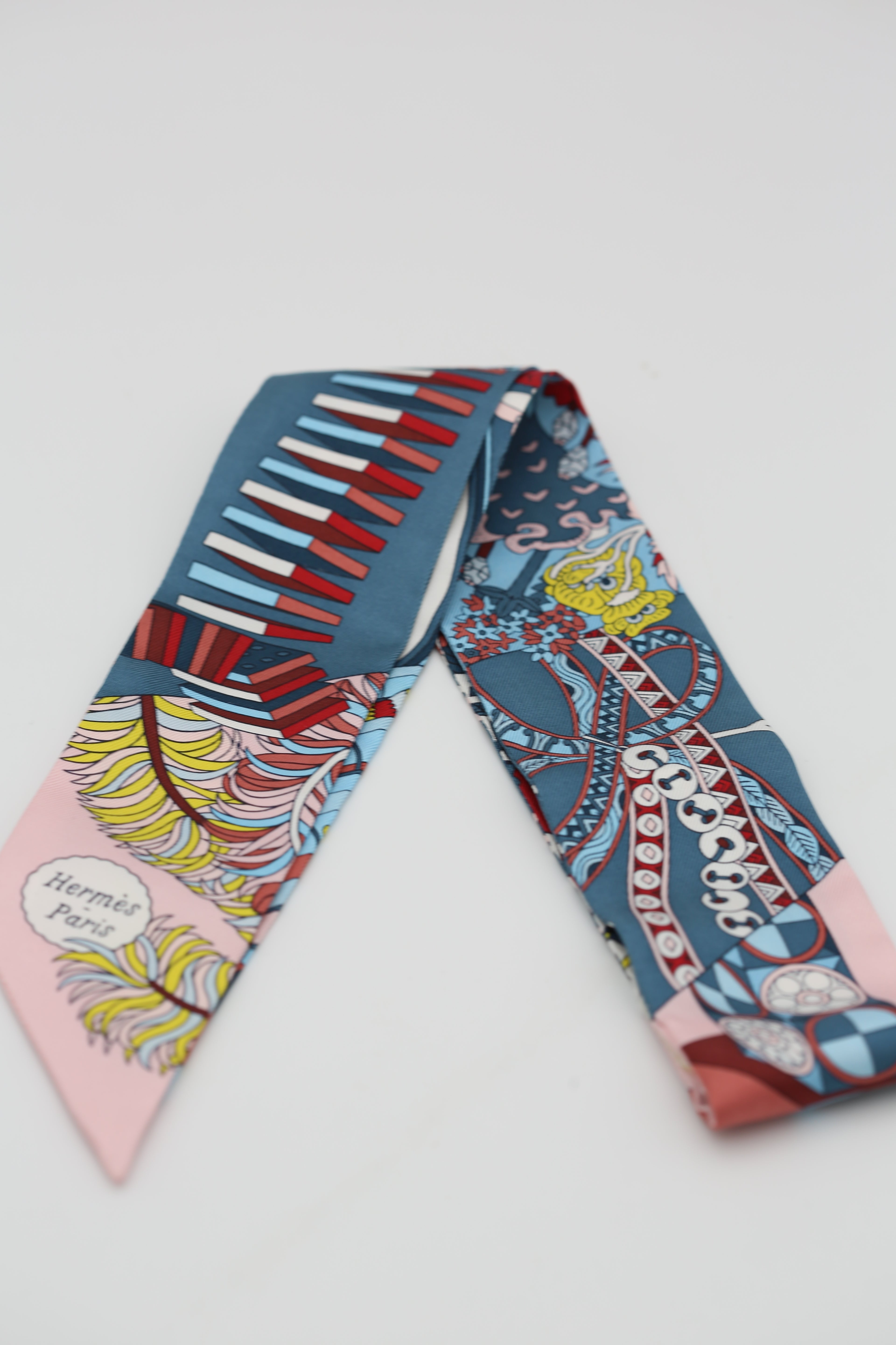 HERMÈS TWILLY DARK BLUE & PINK