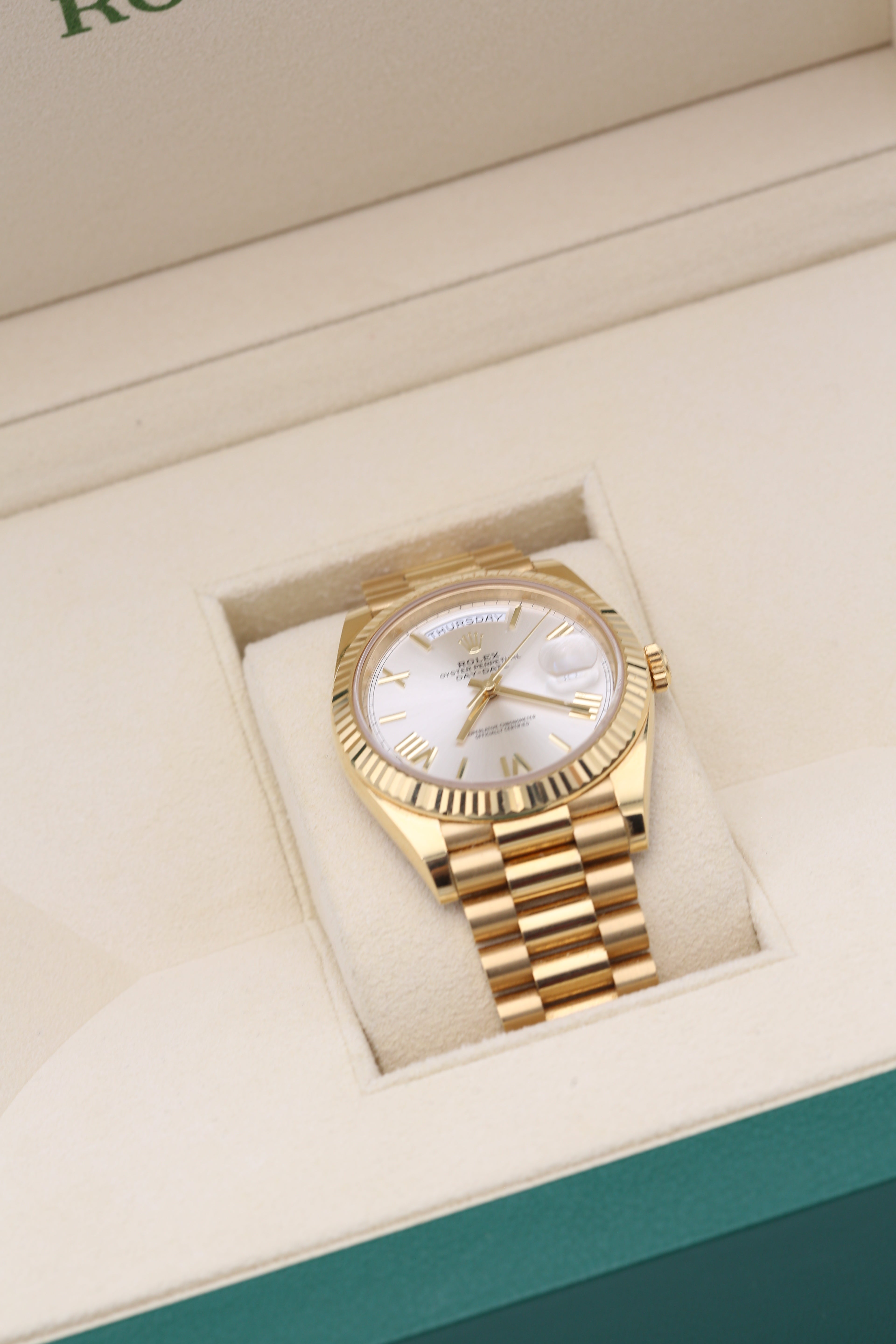 ROLEX OYSTER PERPETUAL DAY-DATE 40MM YELLOW GOLD WITH SILVER DIAL 228238