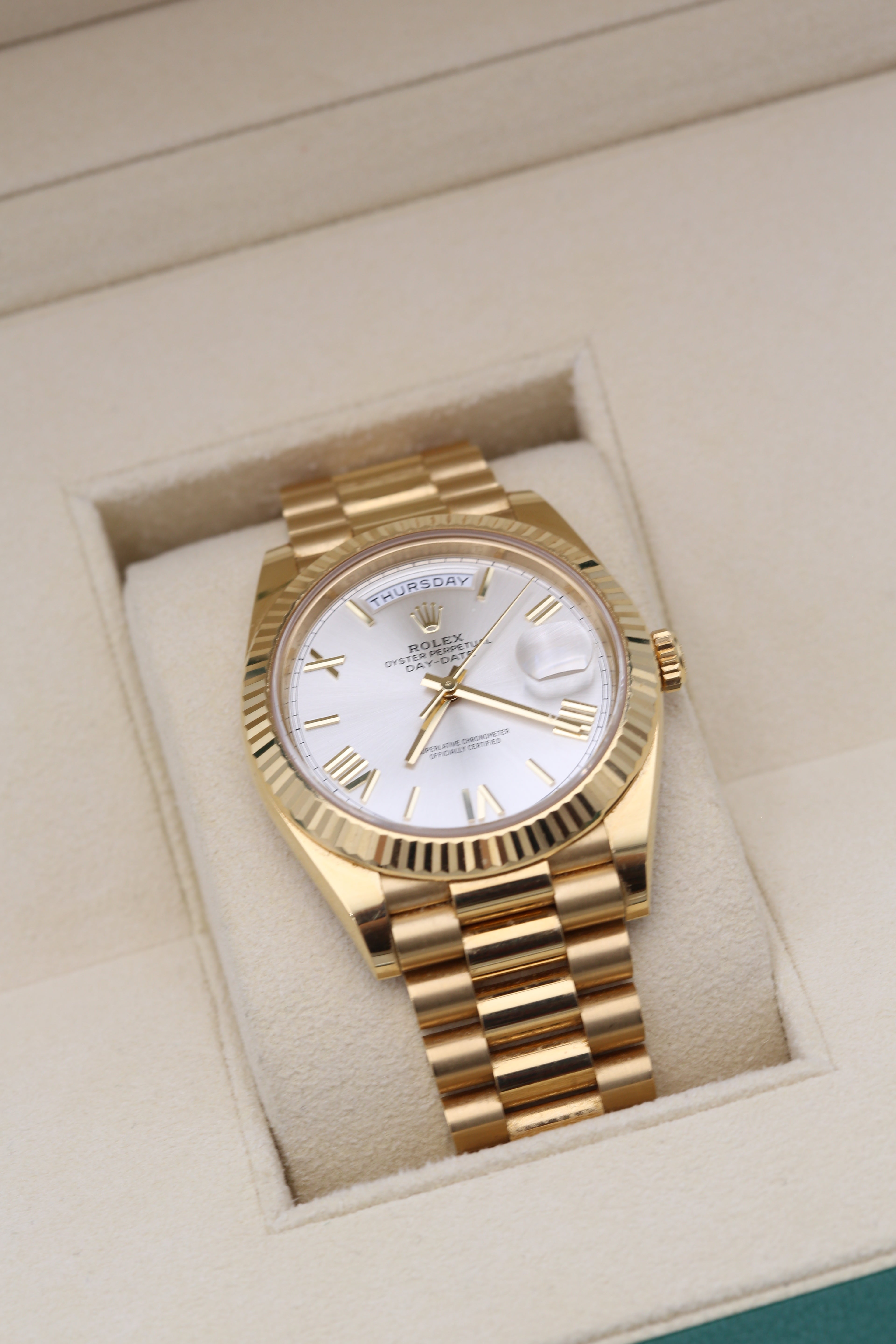 ROLEX OYSTER PERPETUAL DAY-DATE 40MM YELLOW GOLD WITH SILVER DIAL 228238