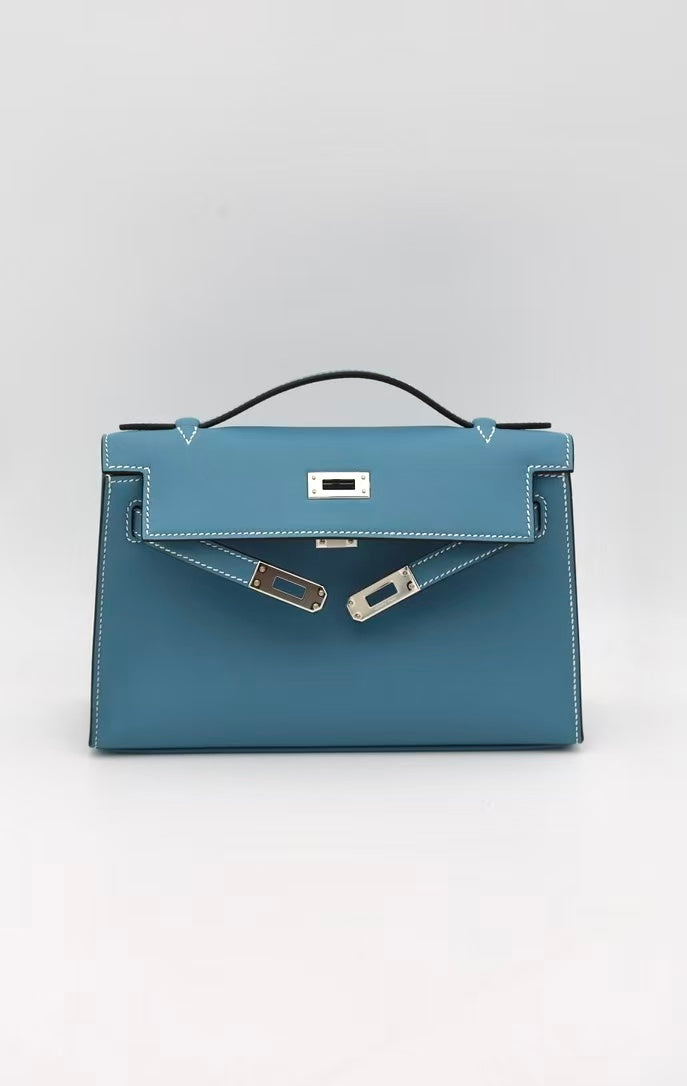 HERMÈS KELLY POCHETTE BLUE SWIFT G STAMP